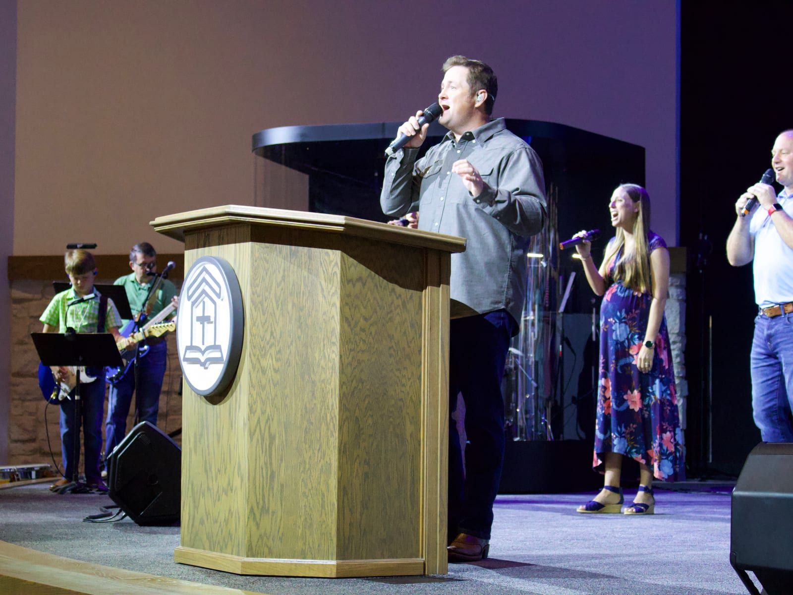 Jeremy Easley, Worship & Music Pastor, leading the congregation in song