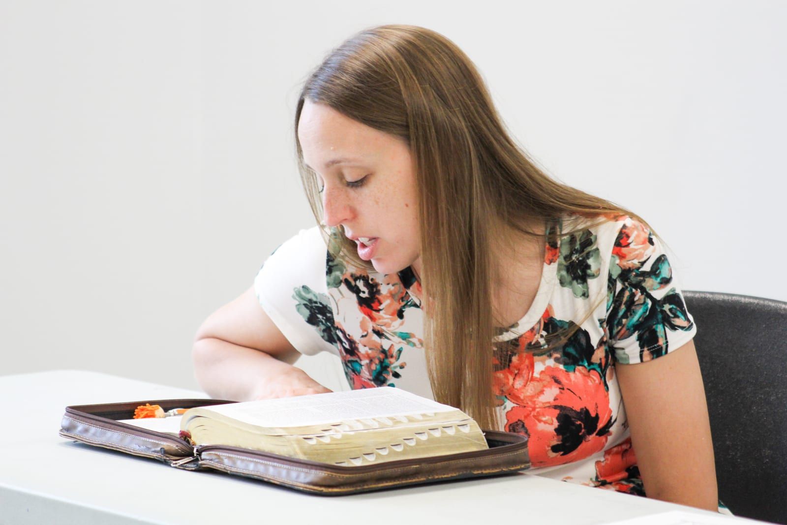 Women studying the Bible together